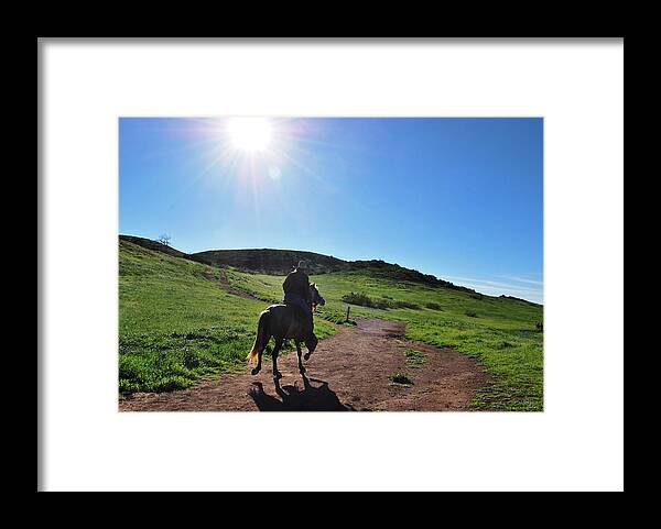 Tree Framed Print featuring the photograph Man Riding Horse Through the Hills by Matt Quest