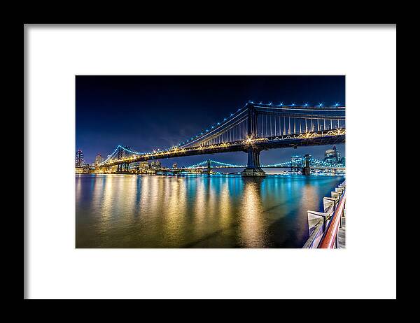Downtown Framed Print featuring the photograph Manhattan and Brooklyn Bridges at night. by Val Black Russian Tourchin