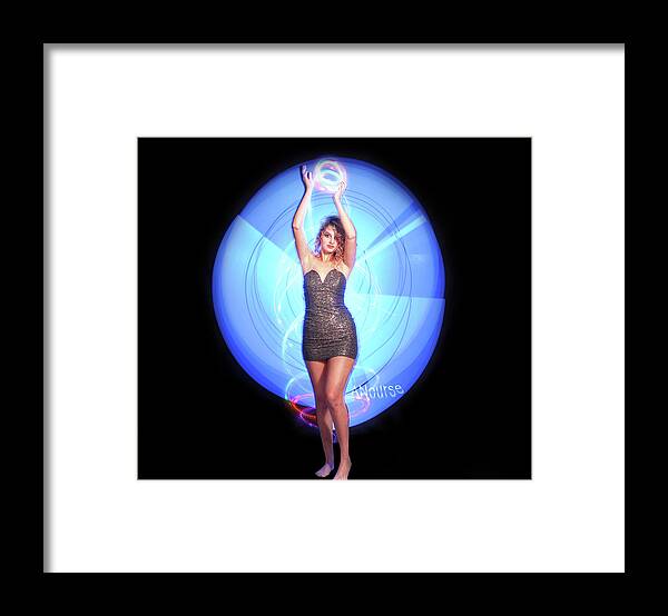 Lightpainting Framed Print featuring the photograph Maria bringing magic to the night. by Andrew Nourse