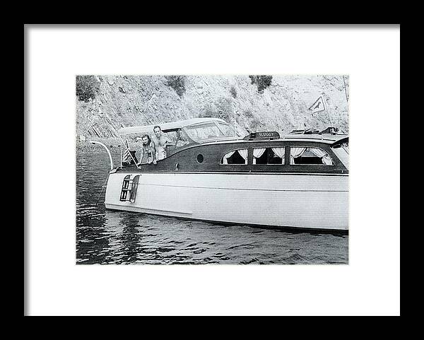 Mayo Methot And Humphrey Bogart On The Powerboat Sluggy Framed Print featuring the photograph Mayo Methot and Humphrey Bogart on the powerboat Sluggy, c.1939 by David Lee Guss