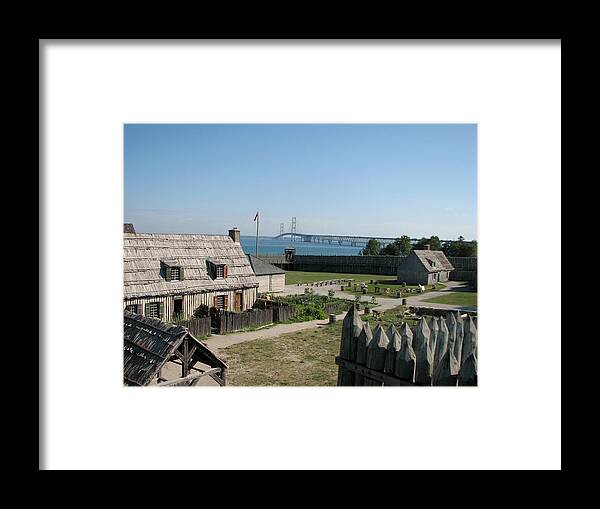 Colonial Michilmackinac Framed Print featuring the photograph Michilimackinac and Mackinac Bridge by Keith Stokes