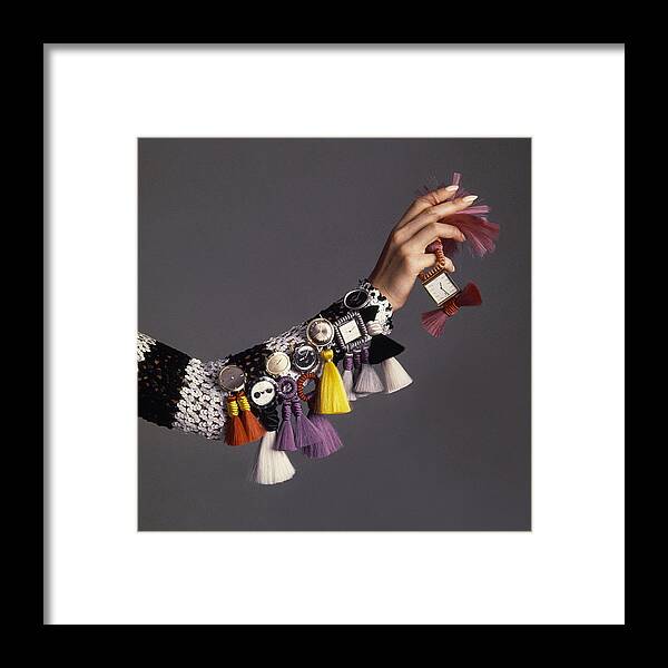 Model Framed Print featuring the photograph Model Sporting Wristwatches by Bert Stern