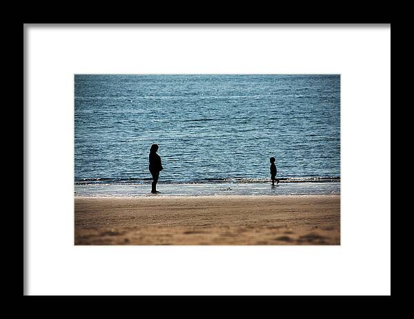 Mom And Son Moments Framed Print featuring the photograph Mom And Son Moments by Karol Livote