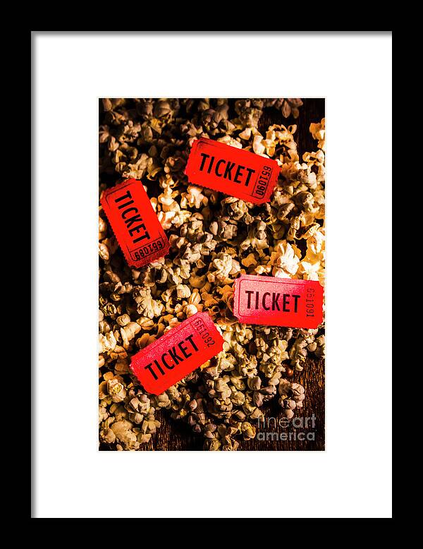 Movie Framed Print featuring the photograph Movie tickets on scattered popcorn by Jorgo Photography