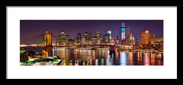 New York City Skyline At Night Framed Print featuring the photograph New York City Brooklyn Bridge and Lower Manhattan at Night NYC by Jon Holiday