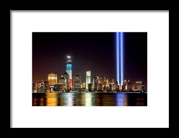 New York City Skyline At Night Framed Print featuring the photograph New York City Skyline Tribute in Lights and Lower Manhattan at Night NYC by Jon Holiday