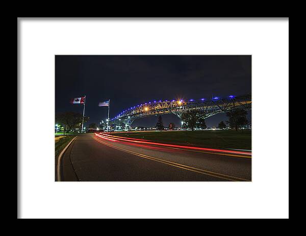 Port Huron Framed Print featuring the photograph Nightly Neighbors at the Blue Water Bridge by Jay Smith