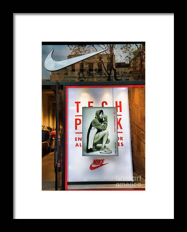 Nike Framed Print featuring the photograph Nike Color Retail Store Barcelona Retail by Chuck Kuhn