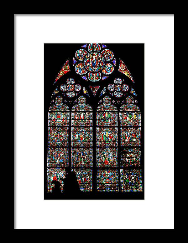 France Framed Print featuring the photograph Notre Dame stained glass and silhouette by Jenny Setchell