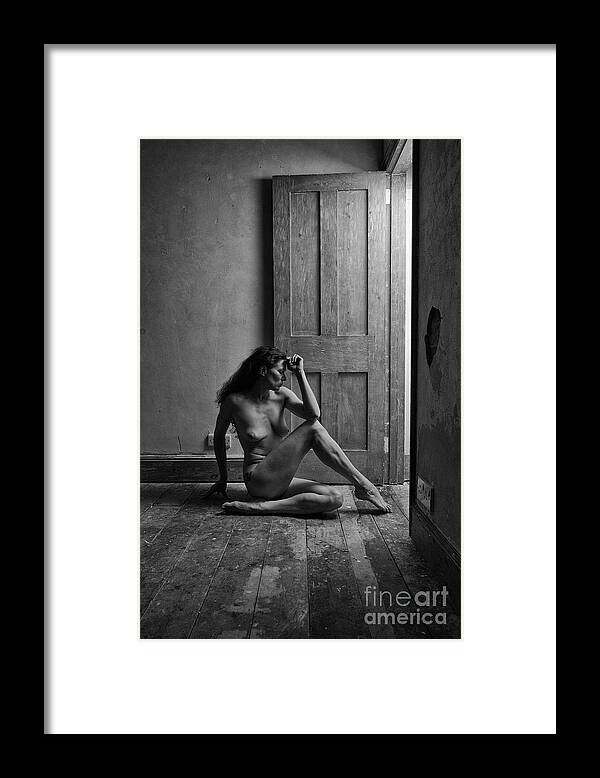 Woman Framed Print featuring the photograph Nude woman sitting by doorway in abandoned room by Clayton Bastiani
