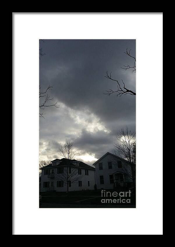 Ominous Clouds Framed Print featuring the photograph Ominous Clouds by Diamante Lavendar