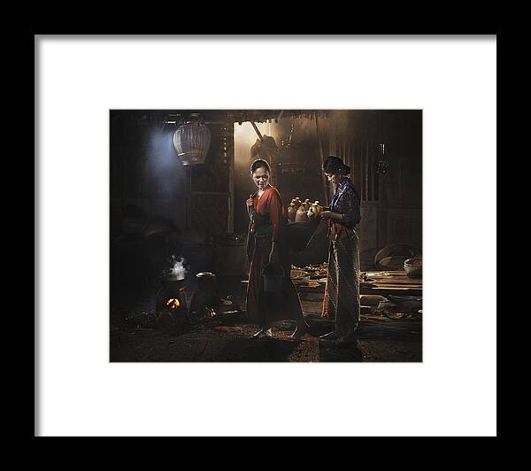 People Framed Print featuring the photograph On My Kitchen by Dodyherawan
