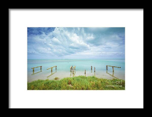 Ocean Framed Print featuring the photograph Paddleboard Hitching Post by Becqi Sherman