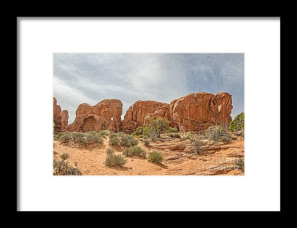 Arches Framed Print featuring the photograph Parade of Elephants by Sue Smith