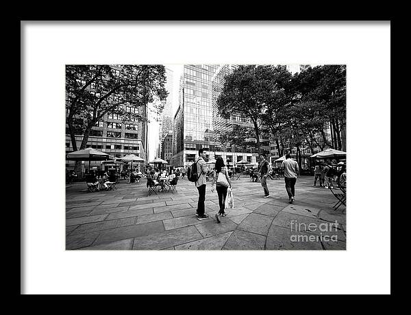 Park Daze Framed Print featuring the photograph Bryant Park Daze in New York City by John Rizzuto