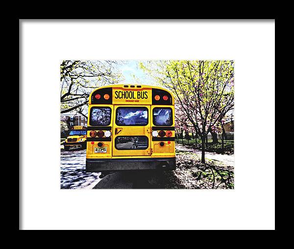 Bus Framed Print featuring the photograph Parked School Buses in Spring by Susan Savad