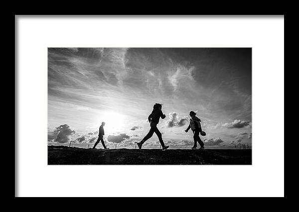 Black Framed Print featuring the photograph People in Howth - Dublin, Ireland - Black and white street photography by Giuseppe Milo