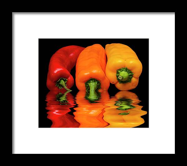 Peppers Framed Print featuring the photograph Peppers Red Yellow Orange by David French