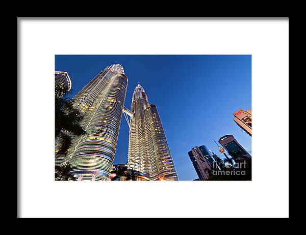 Petronas Towers Framed Print featuring the photograph Petronas Towers by David Bleeker
