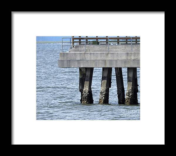 Pier Framed Print featuring the photograph Pier At Low Tide by Jan Gelders