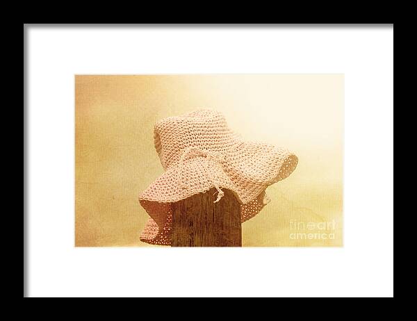 Farm Framed Print featuring the photograph Pink girls hat on farmyard fence post by Jorgo Photography