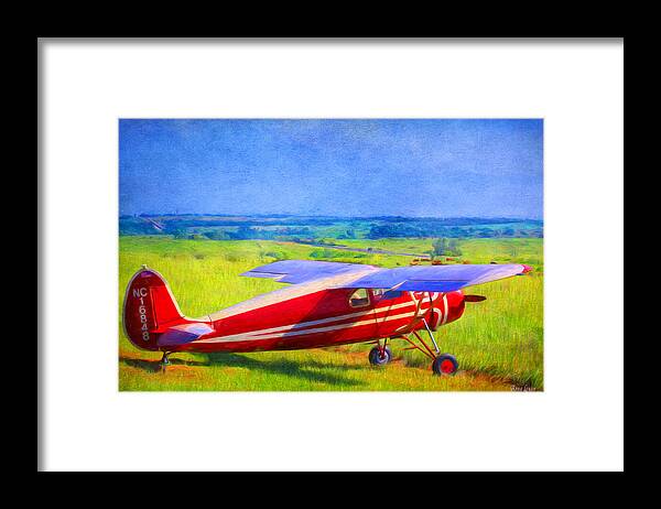 Piper Cub Framed Print featuring the photograph Piper Cub Airplane in Kansas Prairie by Anna Louise