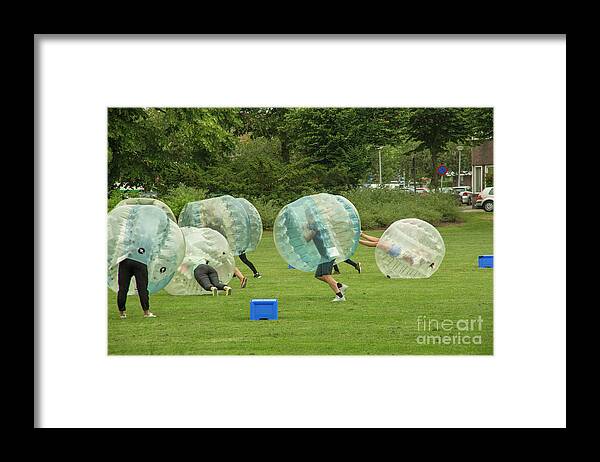 Students Framed Print featuring the photograph Playing bubble bump by Patricia Hofmeester