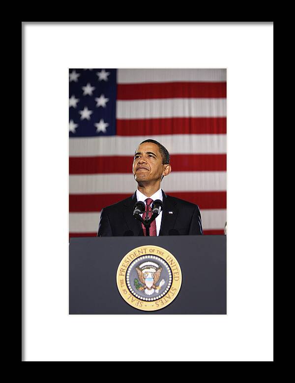 Obama Framed Print featuring the photograph President Obama by War Is Hell Store