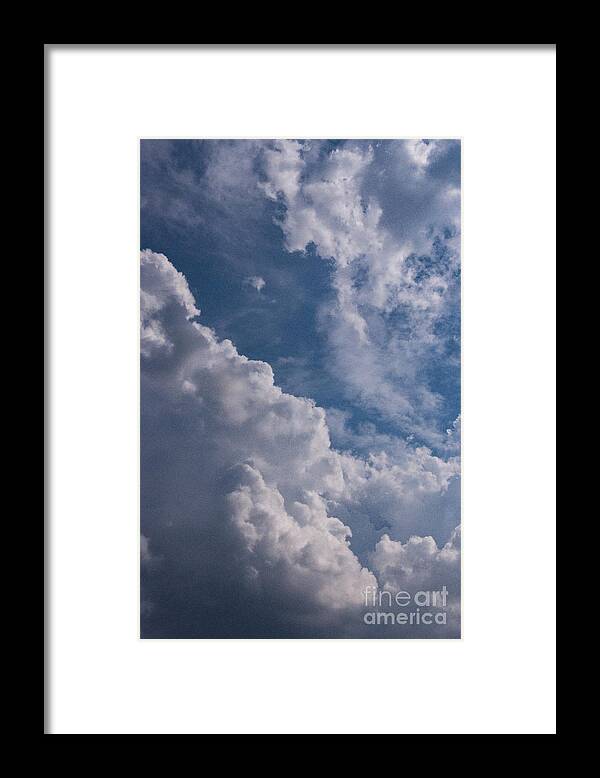 Background Framed Print featuring the photograph Puffy Clouds by Debra Fedchin