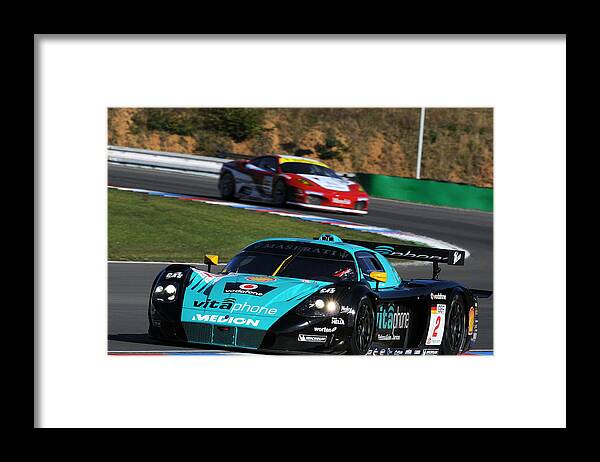 Racing Framed Print featuring the photograph Racing by Mariel Mcmeeking