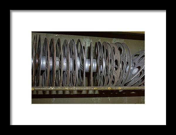 Antique Framed Print featuring the photograph Rack of vintage movie reels by Karen Foley