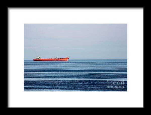 Red Boat In Calm Baltic Sea. Framed Print featuring the photograph Red boat in calm Baltic Sea by Sheila Smart Fine Art Photography