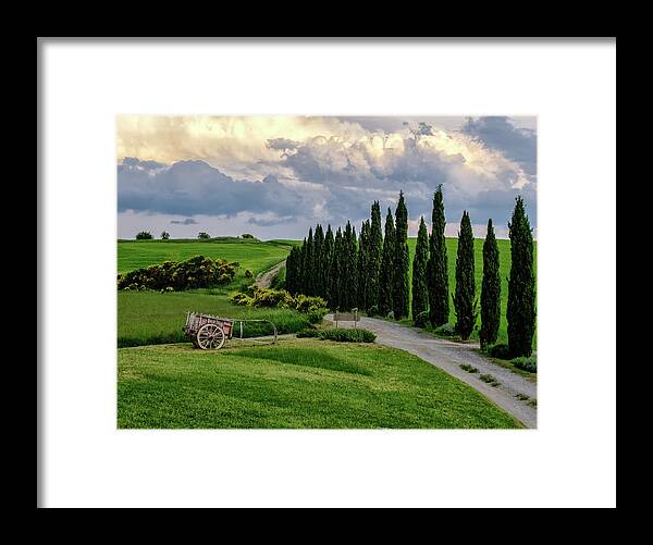Il Rigo Framed Print featuring the photograph Red Cart against Tuscan Sky by Georgette Grossman