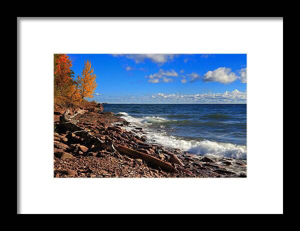 Red Stones And Waves Framed Print featuring the photograph Red Stones and Waves by Rachel Cohen