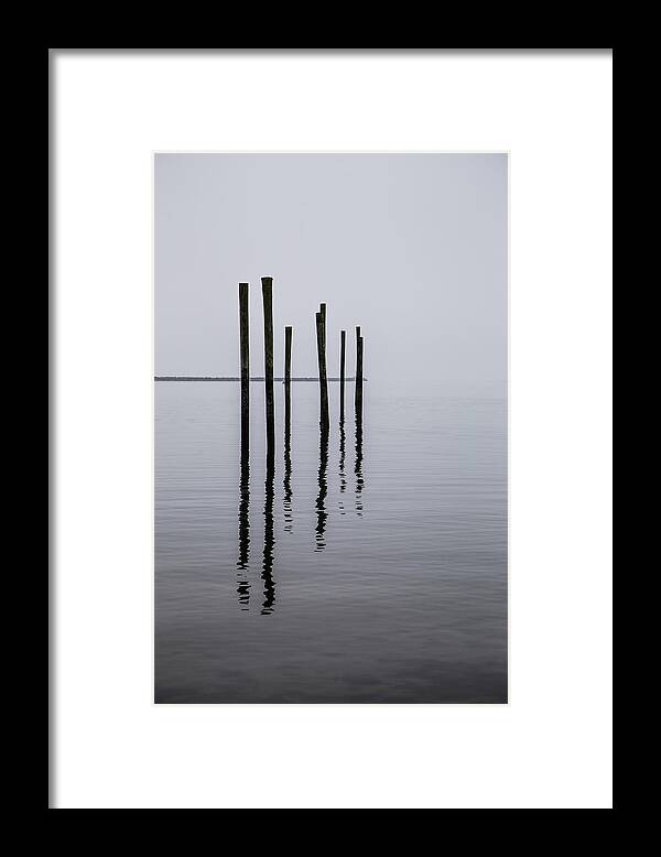 Landscape Framed Print featuring the photograph Reflecting Poles by Karol Livote
