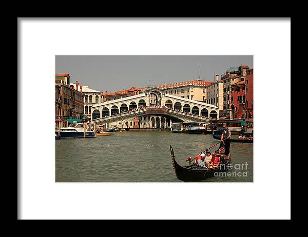 Venice Framed Print featuring the photograph Rialto Bridge in Venice with Gondola by Michael Henderson