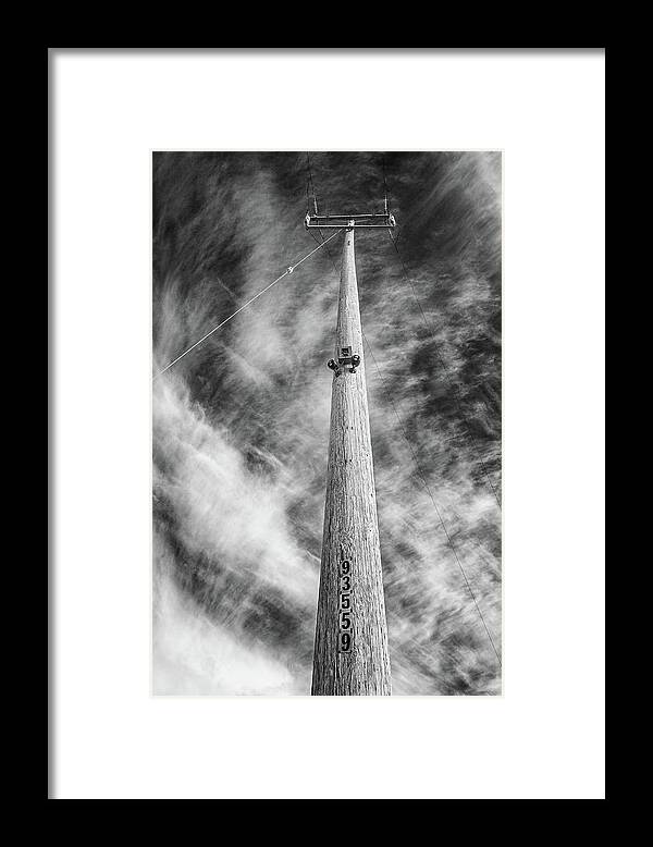 Telephone Poll Framed Print featuring the photograph Rising to the Heights by Greg Nyquist