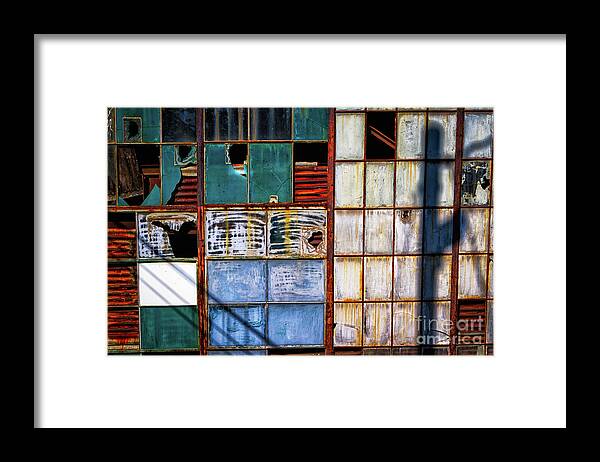 Delapidated Warehouse Framed Print featuring the photograph Rusted Broken and Worn by Doug Sturgess
