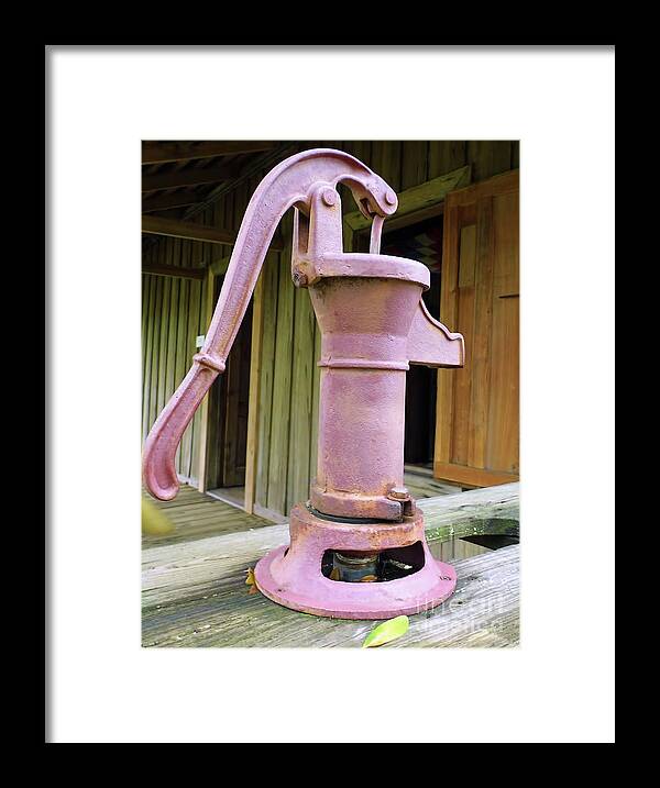 Water Pump Framed Print featuring the photograph Rusty Red Hand Pump by D Hackett