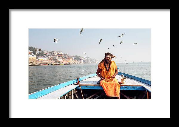 Asia Framed Print featuring the photograph Sadhu in a boat. by Usha Peddamatham