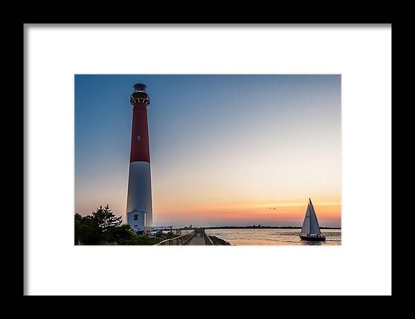 Barnegat Framed Print featuring the photograph Sailboat at sunset at Barnegat by SAURAVphoto Online Store