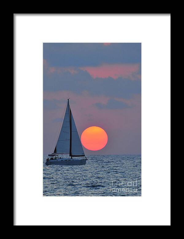 Sail Boats Framed Print featuring the photograph Sailboat at sunset by Shay Levy