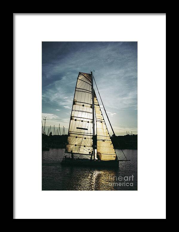Active Framed Print featuring the photograph Sailboat in Front of Sun in Harbor by Andreas Berthold