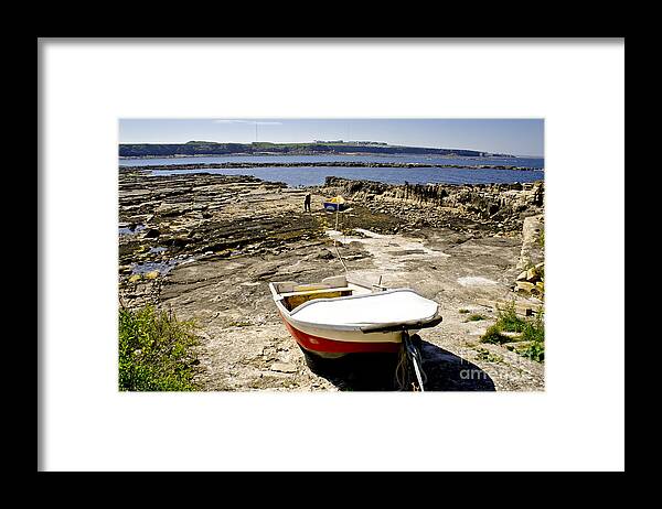 Coast Framed Print featuring the photograph Saint Mary's island in low tide. by Elena Perelman
