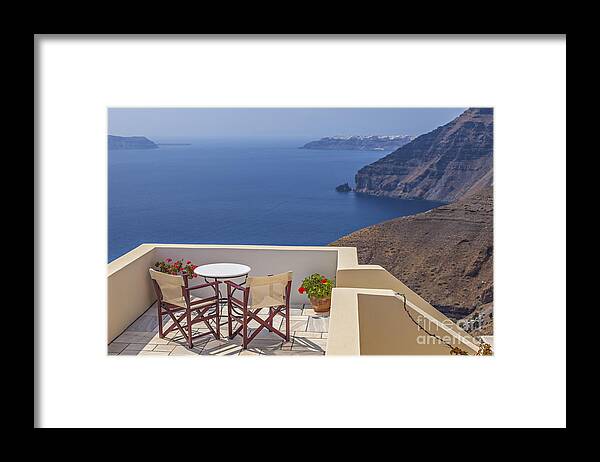 Santorini Framed Print featuring the photograph Santorini sun terrace by Sophie McAulay