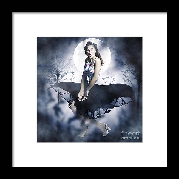 Horror Framed Print featuring the photograph Scared young woman in eerie halloween forest by Jorgo Photography