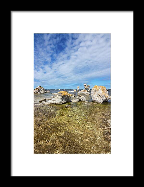 Sea Framed Print featuring the photograph Sea stacks on the East coast of Sweden by GoodMood Art