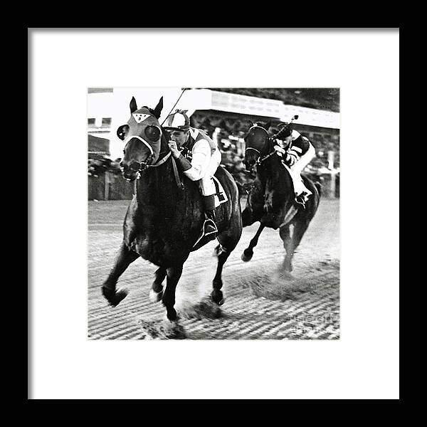 Seabiscuit Framed Print featuring the photograph Seabiscuit and George Woolf lead War Admiral and Jockey Charles Kursinger in the first turn, Pimlico by Thomas Pollart