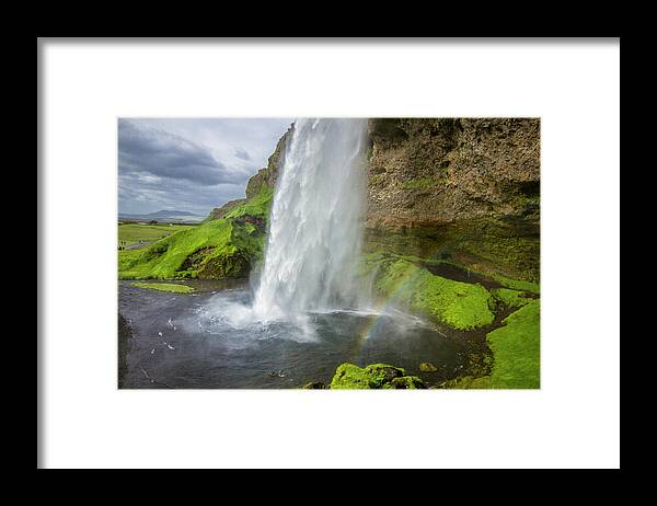 Seljalandsfoss Framed Print featuring the photograph Seljalandsfoss Waterfall with Rainbow, Iceland by Venetia Featherstone-Witty