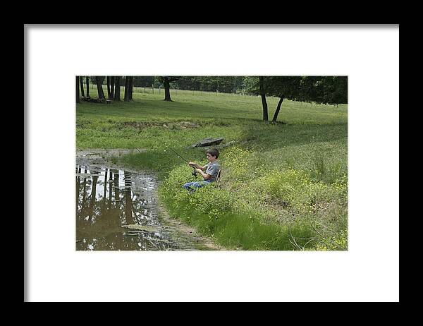 Boy Framed Print featuring the photograph Serious Fishing by Linda A Waterhouse